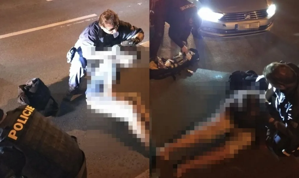 Žena přecházela čtyřproudovou silnici a srazilo ji auto. První pomoc jí poskytli policisté